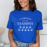 For Grandma with Grandkids Names Personalized T-Shirt<br><div class="desc">Show your love for your favourite people/grandkids with this one-of-a-kind tshirt! Change the recipient's name from grandma to Mimi, Gigi, Nana or whatever your little ones call you - then add their names to the handprints below. There are currently 9 handprints and names but if you have fewer grandchildren, just...</div>