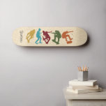 For Skateboarders Skateboarding Graphics Collage Skateboard<br><div class="desc">Surprise your favourite skater with a personalized skate deck. It features silhouette style illustrations of skateboarders in mustard yellow,  turquoise blue,  dark red,  green and rust orange set against a faux woodgrain background and is ready to be personalized with a name in charcoal grey coloured letters.</div>