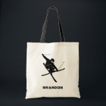 For Skiers Ski Trick Graphic Personalized Tote Bag<br><div class="desc">This tote bag is ready to be personalized with a name,  a custom message or your favourite skiing spot. It features a silhouette style illustration in black of a skier performing a ski trick.</div>