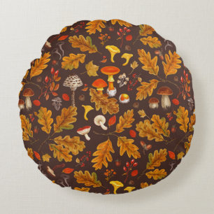 Forest mushrooms and autumn flora on brown round pillow