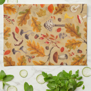 Forest mushrooms and autumn flora on ochre kitchen towel