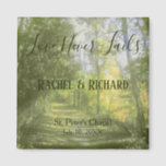 Forest Scenery Wedding Couple Magnet<br><div class="desc">A lovely wedding favour,  this refrigerator magnet features a lovely green and yellow forest background with "Love never fails" written in cute cursive green font.  Underneath is the name of the couple,  venue,  and wedding date.  Great for bridal showers,  bachelorette parties,  etc. Customize yours today!</div>