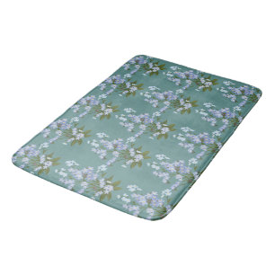 Forget-me-not and Foliage on Teal Background Bath Mat
