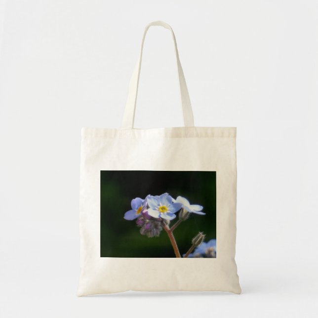 forget me not flower in bloom tote bag (Front)