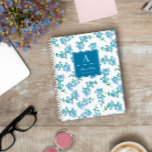 Forget Me Not Pattern Monogrammed Notebook<br><div class="desc">Pretty notebook with a floral pattern of forget-me-nots in blue and green against a white background. Personalize by adding your name,  initial and the subject of the notebook on the blue label. A cute notebook for your thoughts and ideas.</div>
