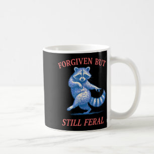 Forgiven but still feral raccoon funny quote coffee mug