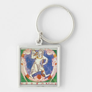 Form of two winged creatures with entwined keychain