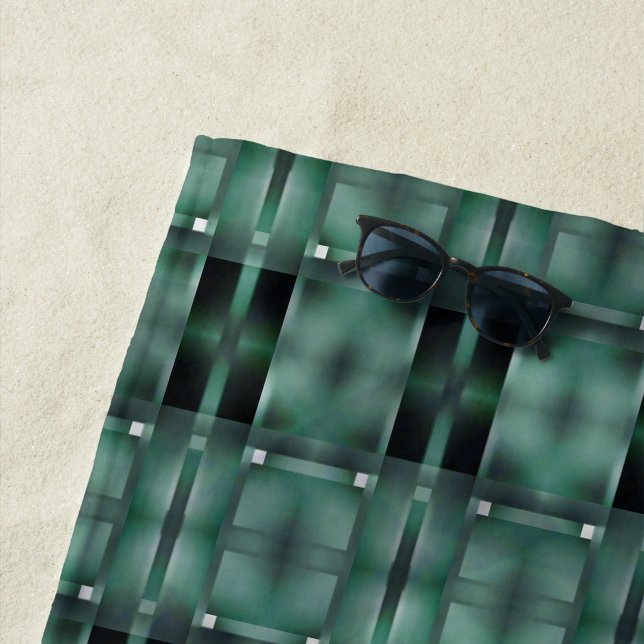 Formats of rectangles in greens, spotted dark beach towel (In Situ)