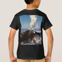 Fountain of hot lava erupts from crater volcano