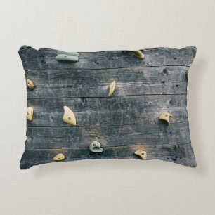 Four brown wooden wall decors accent pillow