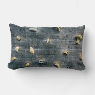 Four brown wooden wall decors lumbar pillow