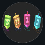Four Dreidels Stickers<br><div class="desc">Four multicolored dreidels showing nun, gimel, hei, and shin. Nes Gadol Hayah Sham. A Chanukah design.</div>