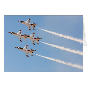 Four F-16 Thunderbirds fly in close formation