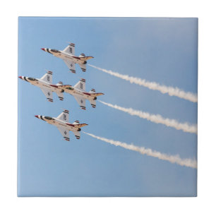 Four F-16 Thunderbirds fly in close formation Tile