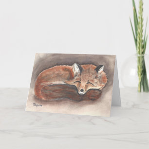 Fox dormant dans la carte de vacances de neige
