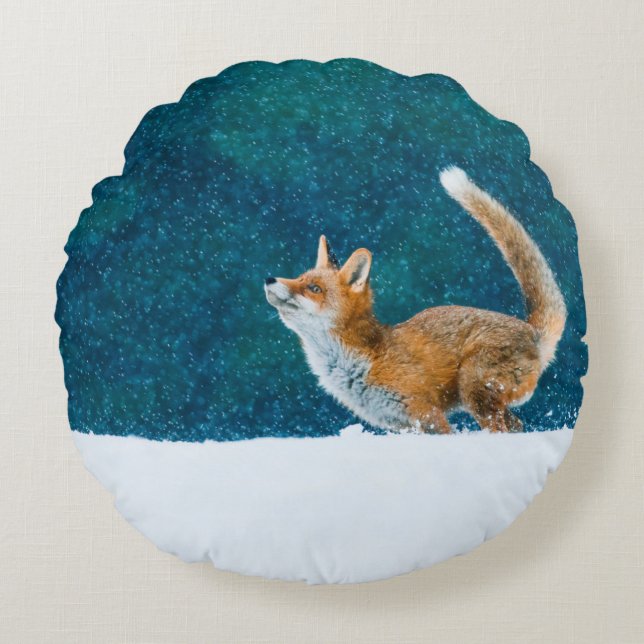 Fox in snowfall. Red fox, Vulpes vulpes, jumping i Round Pillow (Front)
