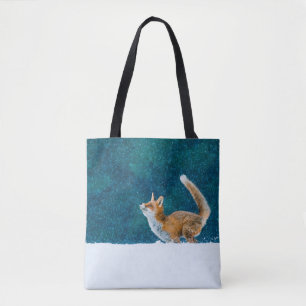 Fox in snowfall. Red fox, Vulpes vulpes, jumping i Tote Bag