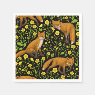 Foxes and buttercups on black napkin
