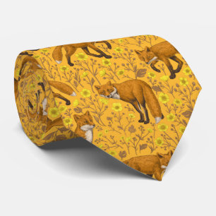 Foxes and buttercups on orange tie