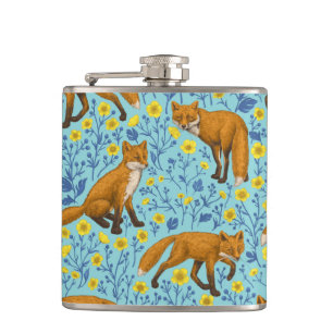 Foxes and buttercups on pool blue hip flask