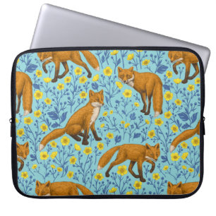 Foxes and buttercups on pool blue laptop sleeve