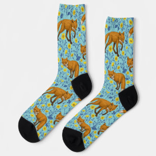 Foxes and buttercups on pool blue socks