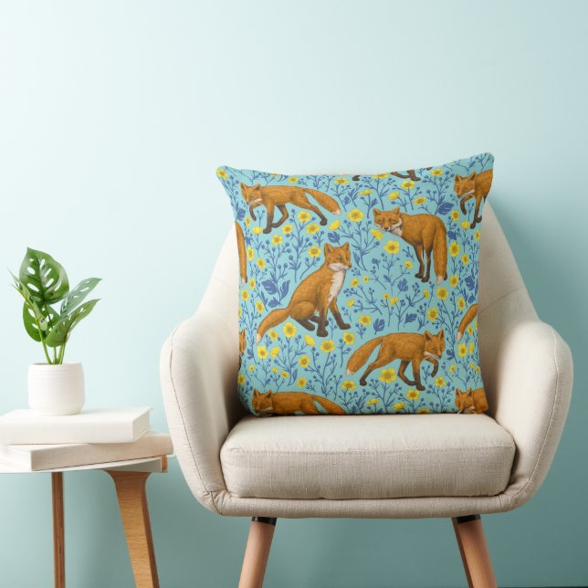 Foxes and buttercups on pool blue throw pillow (Chair)