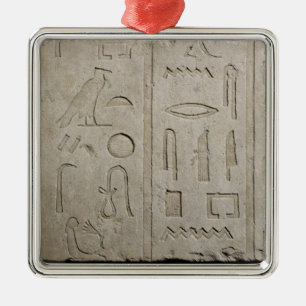 Fragment of a hieroglyphic inscription metal ornament