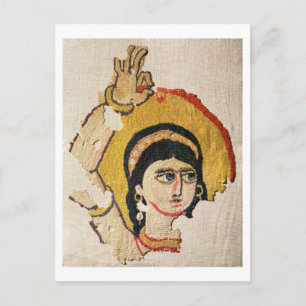 Fragment of a tapestry depicting the head of a dan postcard