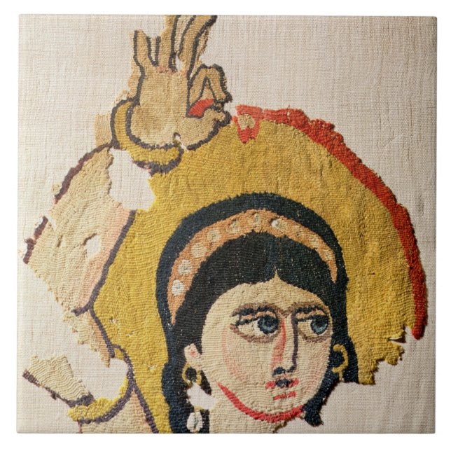 Fragment of a tapestry depicting the head of a dan tile (Front)