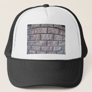 Fragment of the wall of the large grey concrete bl trucker hat