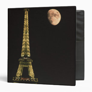 France, Paris. Eiffel Tower at night with Binder