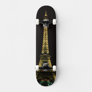 France, Paris. Eiffel Tower at night with Skateboard