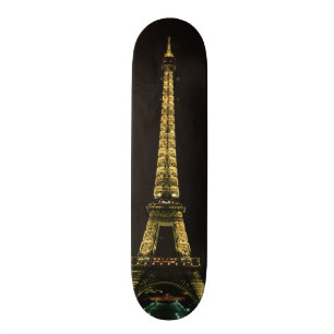 France, Paris. Eiffel Tower at night with Skateboard