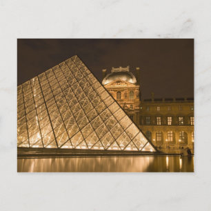 France, Paris. The Louvre at twilight. Credit 2 Postcard