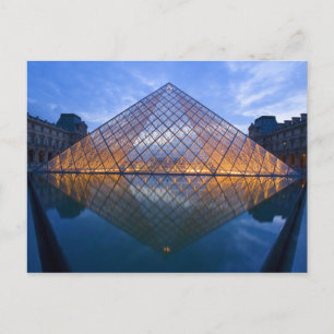 France, Paris. The Louvre at twilight. Credit Postcard