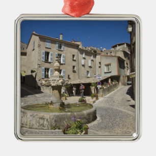 France, Provence, Valensole. Tourists explore Metal Ornament