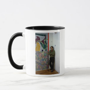Frank Stella  beside one of his works Mug