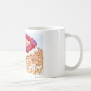 Frankfurt crown cake with cherries on rustic wood coffee mug