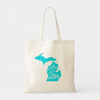 Frappé avec le sac fourre-tout à mitaine