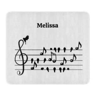 Free as a bird, song birds acting as musical notes cutting board