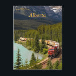 Freight Train Through Morants Curve Alberta  Postcard<br><div class="desc">This postcard features a view of a freight train moving through Morant’s Curve,  Improvement District No. 9 in Alberta,  Canada. Photo credit: Andy Holmes,  2020.

Enjoy your View of Freight Train Through Morant's Curve Alberta Postcard!</div>