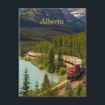 Freight Train Through Morants Curve Alberta  Postcard<br><div class="desc">This postcard features a view of a freight train moving through Morant’s Curve,  Improvement District No. 9 in Alberta,  Canada. Photo credit: Andy Holmes,  2020.

Enjoy your View of Freight Train Through Morant's Curve Alberta Postcard!</div>