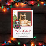 French Bulldog Christmas Tree Pet Dog One Photo Holiday Card<br><div class="desc">This cute French Bulldog themed Christmas card features a Frenchie wearing a Santa hat sitting in front of a lit Christmas tree. The salutation on the card reads "Merry Christmas", the message reads "We hope your holiday season is paws-itively amazing!" and finally there is a salutation. All of these sections...</div>