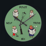 French Clock Vintage Reading Lampost<br><div class="desc">This handy wall clock features vintage French cartoon figures and numbers,  and would be perfect for the tiny francophile in your life who's looking to learn some new digits!</div>