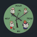 French Clock Vintage Reading Lampost<br><div class="desc">This handy wall clock features vintage French cartoon figures and numbers,  and would be perfect for the tiny francophile in your life who's looking to learn some new digits!</div>