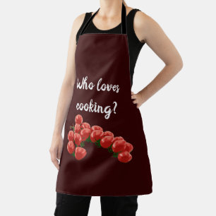 Fresh cherry tomatoes on a branch with text apron
