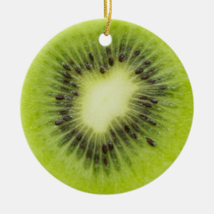 Fresh kiwi fruit. Round slice closeup isolated Ceramic Ornament