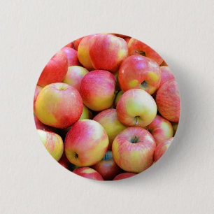 Fresh red and yellow apples 2 inch round button