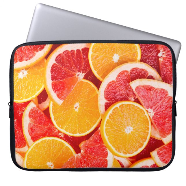 Fresh ripe orange and grapefruit backgroundbackgro laptop sleeve (Front)